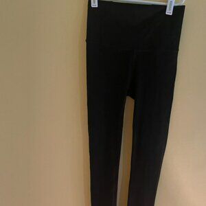 Lululemon Black Leggings with Hole Pattern on Side Size 2/4